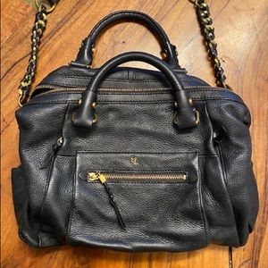 Black leather purse by Elliot Luca